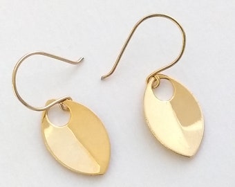 Gold petal dangle earrings