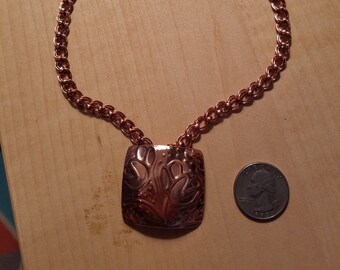 Collar de flores de cobre