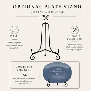 May include: Black iron plate stand, 8 inches tall, with a decorative design. The image also shows a blue plate with the text "DAD'S GRILLING PLATE". The stand is made of durable black iron.