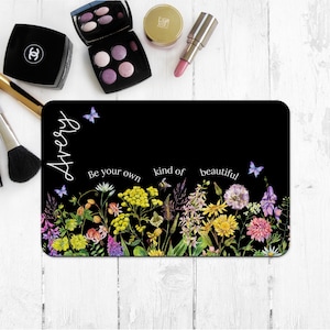 May include: Black and white floral design with the text "Be your own kind of beautiful" and the name "Avery" on a black background.