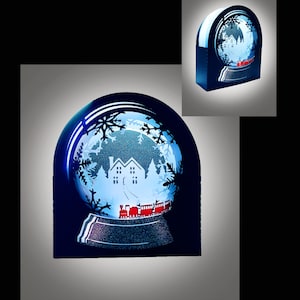 Modello globo della neve della Winter wonderland scena treno