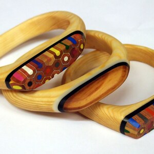 Recycled wooden bracelets with coloured pencil crayons