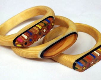 Recycled wooden bracelets with coloured pencil crayons