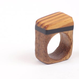 Recycled wooden ring acrylic layers