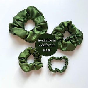 May include: Four green satin scrunchies of different sizes. Available in 4 different sizes.