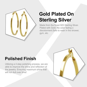 May include: A pair of gold-plated sterling silver hoop earrings. The earrings are made from 925 sterling silver and are plated with gold. They are safe to wear in the shower, gym, etc. The earrings have a polished finish.
