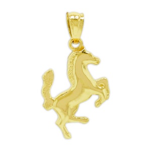 May include: A gold-colored horse pendant charm. The horse is standing on its hind legs with its front legs raised. The pendant has a loop at the top for attaching to a chain.