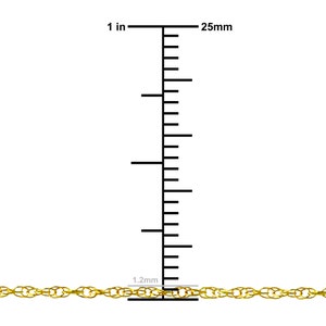May include: A gold chain necklace with a 1.2 mm width. The chain is 25 mm long. The chain is made of gold and is a popular choice for jewelry.