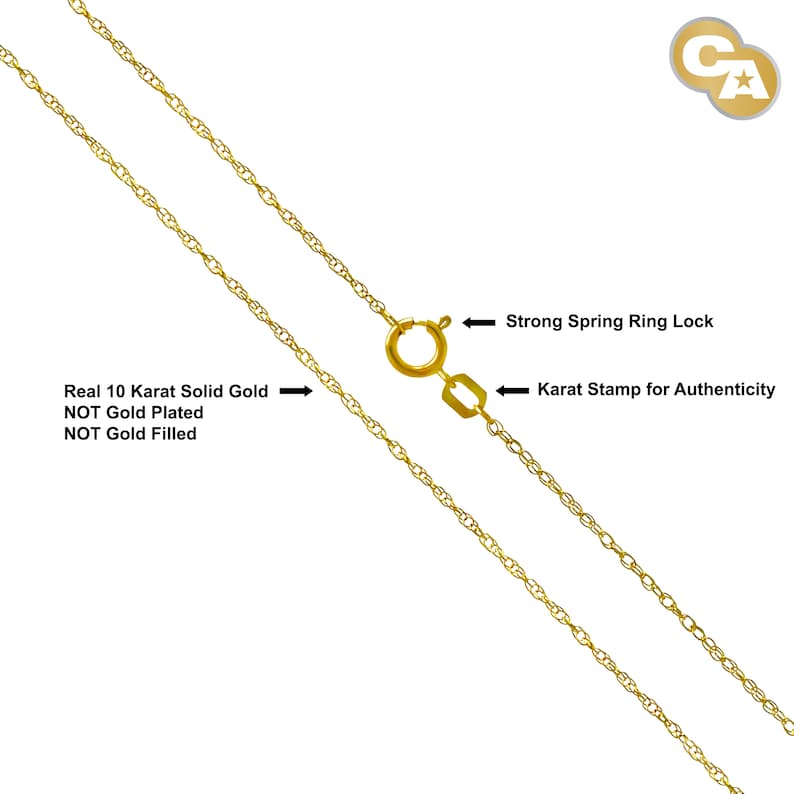 May include: A close-up of a 10 karat gold chain necklace with a spring ring clasp. The chain is a delicate, twisted design. The text "Real 10 Karat Solid Gold NOT Gold Plated NOT Gold Filled" is visible in the image.