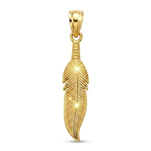 May include: A gold-coloured feather pendant with detailed design. The pendant has a loop at the top for a chain and a textured surface. The pendant is approximately 6.35 cm long.