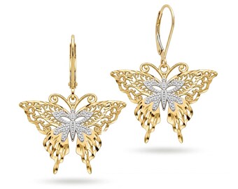 May include: A pair of leverback earrings featuring a butterfly design. Each butterfly has a yellow gold filigree wing structure with a textured finish and a smaller, solid white gold butterfly overlay in the center with a dotted surface pattern.