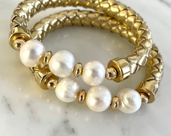 Fresh water pearl with golden braided cord