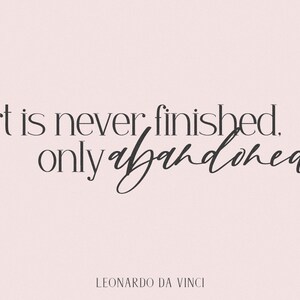 May include: A quote by Leonardo da Vinci on a pink background: "Art is never finished, only abandoned."