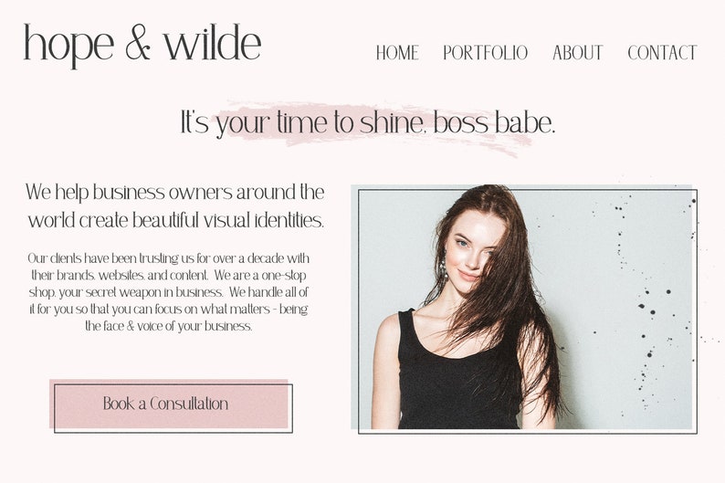 May include: Website homepage for a business called "hope & wilde" that helps business owners create visual identities. The text "It's your time to shine, boss babe." is displayed in a pink brushstroke. A woman with long brown hair is pictured in the background.