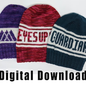 May include: Three knitted hats with different coloured stripes and text. The first hat is purple with white stripes and the text "A". The second hat is red with white stripes and the text "EYES UP". The third hat is teal with white stripes and the text "GUARDIAN".