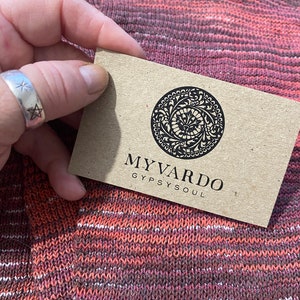 May include: A brown card with a black circular design and the text "MY VARDO GYPSY SOUL".