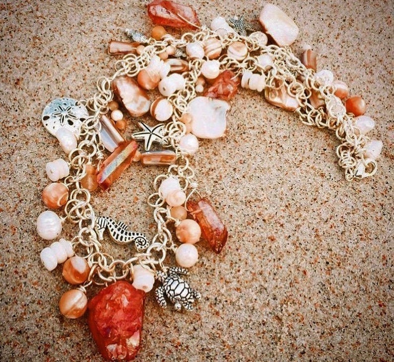 18-Inch Rhodium Plated Necklace with 6mm Light Amethyst Birthstone Beads and Sterling Silver Mater Dolorosa Charm. 18-Inch Rhodium Plated Necklace with 6mm Light Amethyst Birthstone Beads and Sterling Silver Mater Dolorosa Charm.