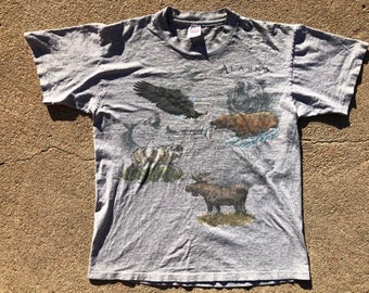 Vtg 90s Alaska "Untamed Spirits" Camiseta de punto único con estampado animal