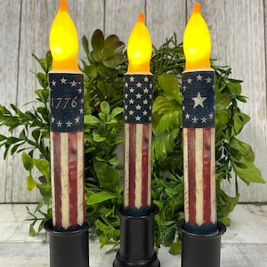 Americana Taper Candles 6” w/Timer 3 Designs 1776 # 004 or Circle Star #003 Flag 010 for 12.95 Ea Buy with Candle Holder for 14.95 Ea