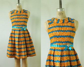 vintage 1960s party dress | vintage orange + blue dress | african inspired print dress | vintage 60s orange dress