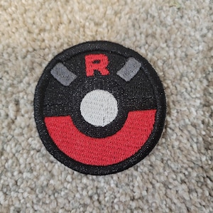 Team Rocket Magical creature capture ball patch