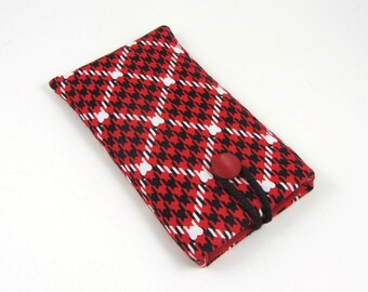 May include: Red and black houndstooth fabric phone case with a red button closure.