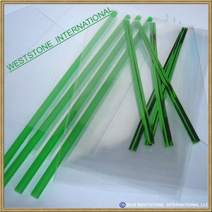 May include: A close-up of green and black plastic twist ties. The twist ties are on a clear plastic surface. The text "WESTSTONE INTERNATIONAL" is visible in the top left corner of the image.
