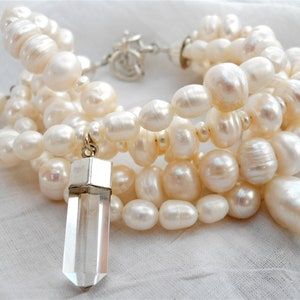 freshwater pearl beaded bracelet with baroque pearl & crystal quartz charms set in sterling silver