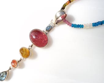 blue, pink tourmaline, citrine, sunstone cabochons + faceted blue topaz pendant. beaded chain - ethiopian opals, apatite, emerald, tanzanite