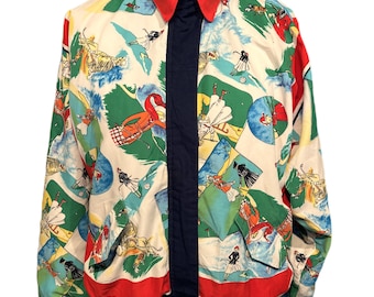 May include: A vintage jacket with a colorful print featuring figures in various sporting activities. The jacket has a red collar, cuffs, and trim, with a navy blue center stripe. The background is white, with green, blue, and yellow accents.