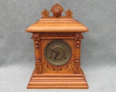Antique 1875 Ingraham Mantle clock 8 day 1 2 hour strike carved columns finials brass face Oak wood table shelf display Vintage excellent