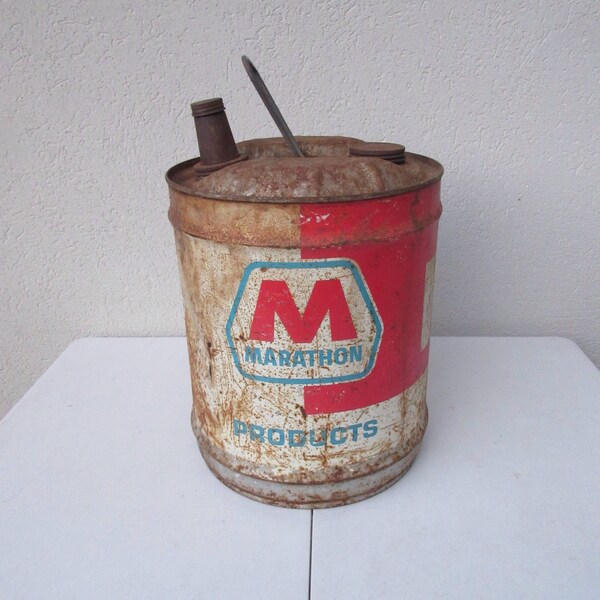 Vintage Marathon Products Metal Automotive gas can with handle and capped or lidded spout rust, rusty and vintage patina