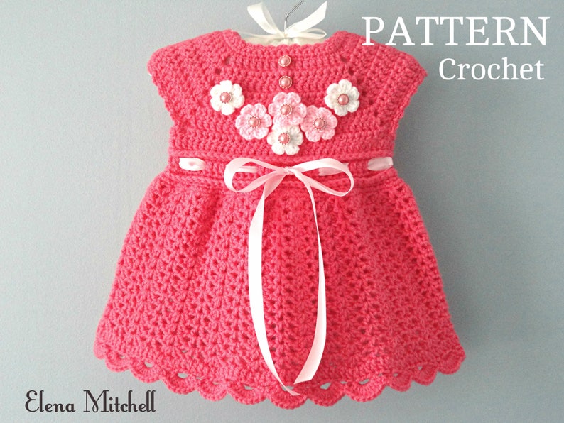 May include: A pink crochet baby dress with a white ribbon and flower embellishments. The dress has a scalloped hem and is made with a delicate crochet stitch. The text "PATTERN Crochet" is visible in the top right corner of the image.