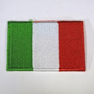 May include: A green, white, and red embroidered patch depicting the Italian flag.