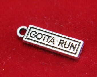 10pc "gotta run" charms in silver style (BC1160)