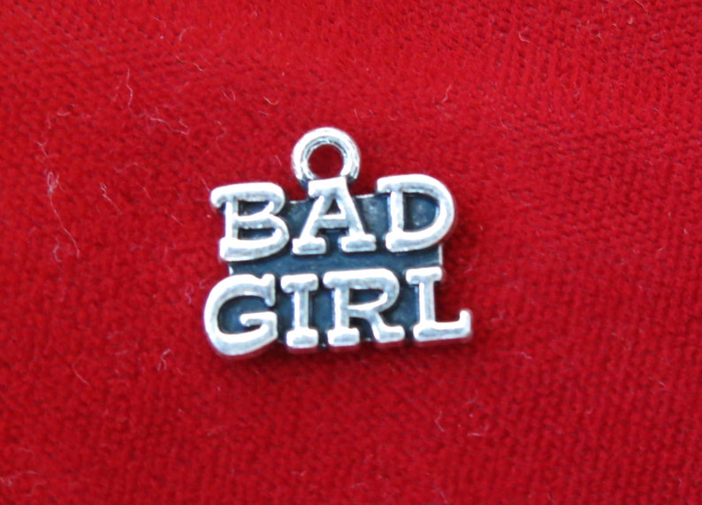 BC804 10pc Bad girl charms in antique silver