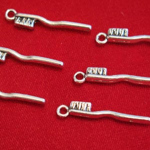 10pc "toothbrush" charms in antique silver style (BC471)