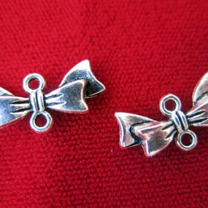 BULK! 30pc &quot;Bowtie&quot; charms in antique silver style (BC407B)