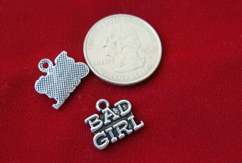 BC804 10pc Bad girl charms in antique silver
