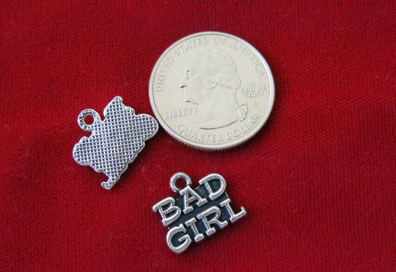 BC804 10pc Bad girl charms in antique silver