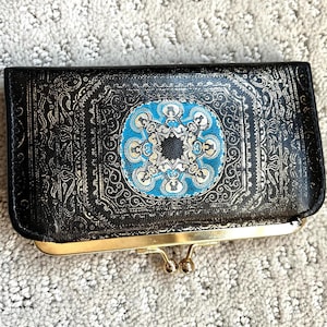 Monedero vintage italiano negro con relieve dorado
