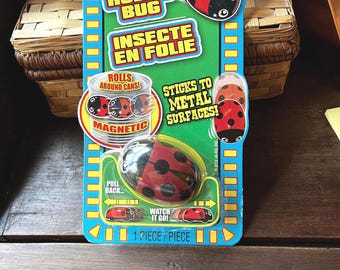 Vintage Magnetic Roll-A-Bug Rolls Pull-Back Ladybug Toy In Original Packaging