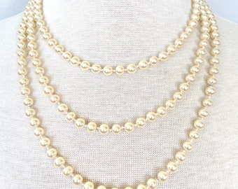 Long faux pearl necklace