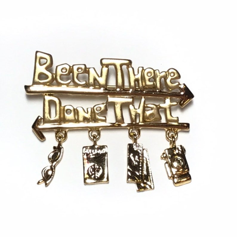 Been there done that brooch by Danecraft