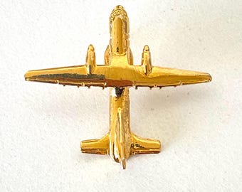 Pin de avión Golden Air