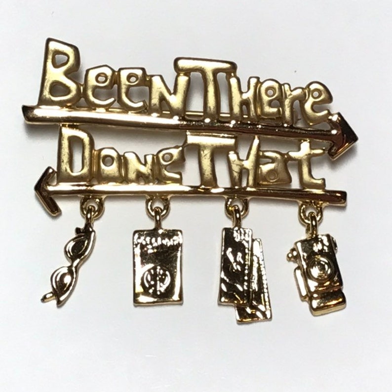 Been there done that brooch by Danecraft