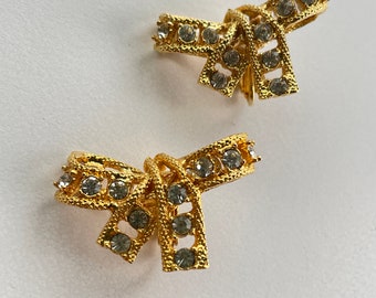 Golden  bow clip on earrings