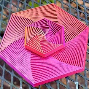 ヘックス フィジェット トイ - マゼンタ ファイア