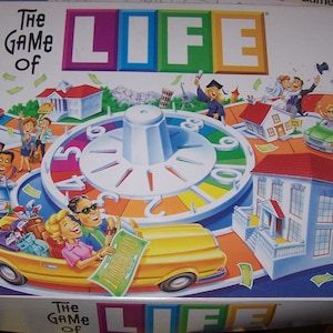 Dated 2000 - The Game of LIFE Board Game - Milton Bradley - Ages 9 to Adult - Model number 04000 - Family Game Night