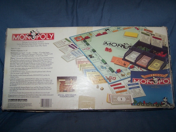 Monopoly-Deluxe 50e anniversaire Edition-Parker Brothers-Gold Tone  Tokens-maisons en bois et hôtels -  France
